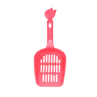 Pink pet scoop on a white background