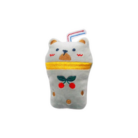 Plush toy resembling a bear with a straw and cherry design